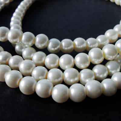 珍珠项链搭衣指南 轻松穿出高级感 第2张 珍珠项链搭衣指南 轻松穿出高级感 第2张